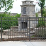 stone fire pit landscape project in milwaukee