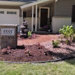 residential red brick entry walkway to front door