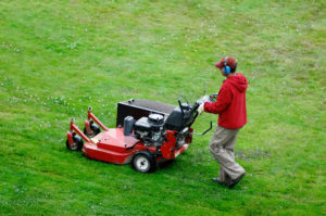 man mowing lawn