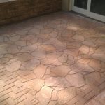 tan stone floor of entryway to home