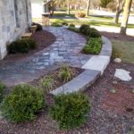 colored brick stone installation outside of house