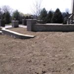 dirt covering residential brick patio installation project