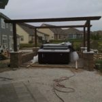 hot tub in back patio area under construction