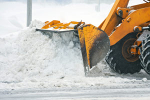 snowplow clearing snow after a storm